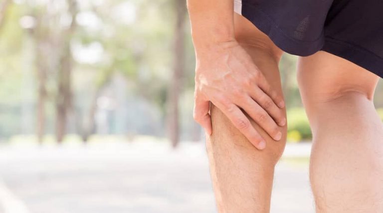 the man shown in the image experiencing muscle knots