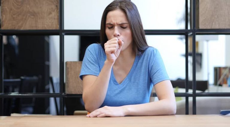 A women who coughing experiencing Pulmonary fibrosis