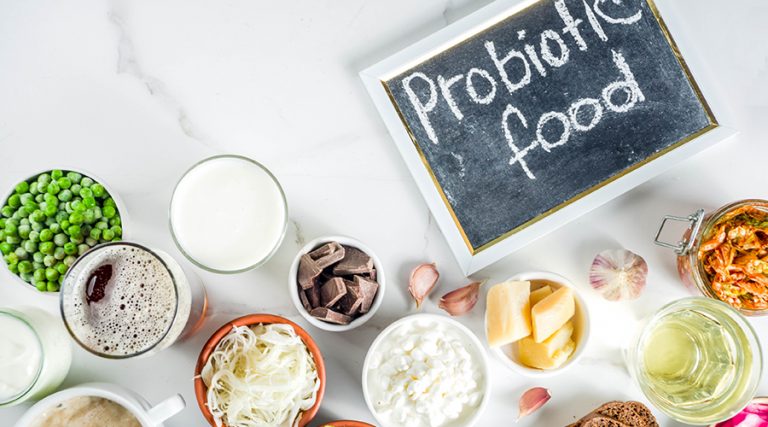 table filled with bowls of food which are probiotic