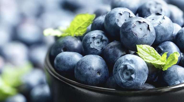 a bowl filled with blueberries