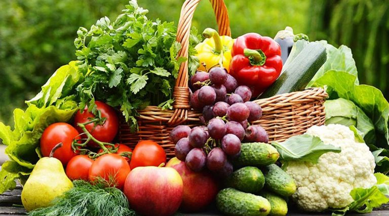 basket filled with different types of fruits and vegetables