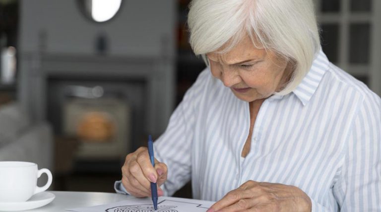 a picture of old women doing brain exercises